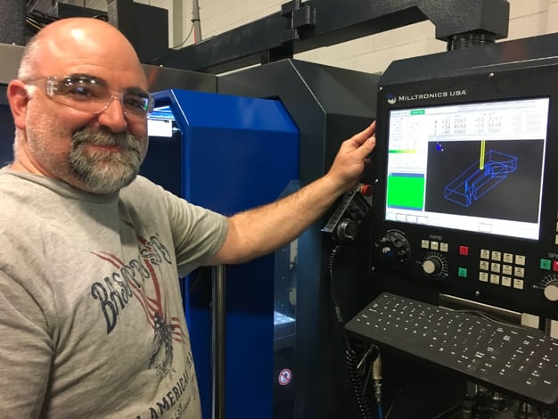 Stecker employee working at a CNC machine